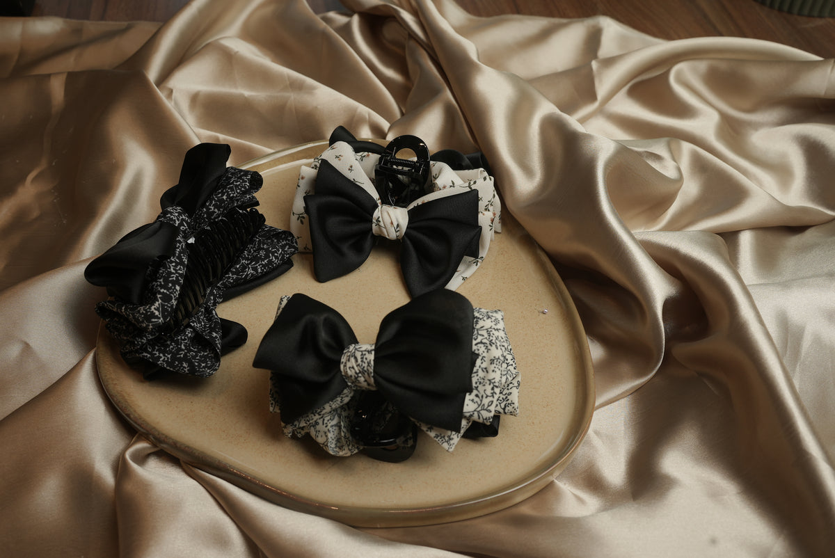 Dual bow styled claw