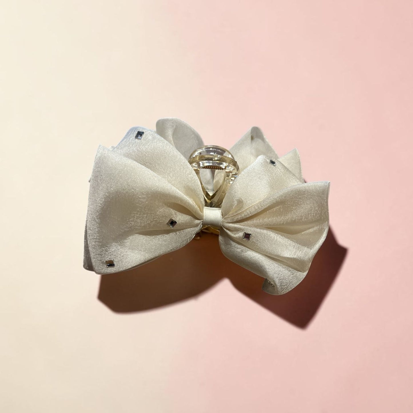 Soft luxe bow claw