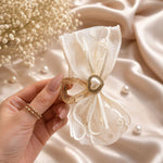 Ivory Pearl Bow Claw Clip