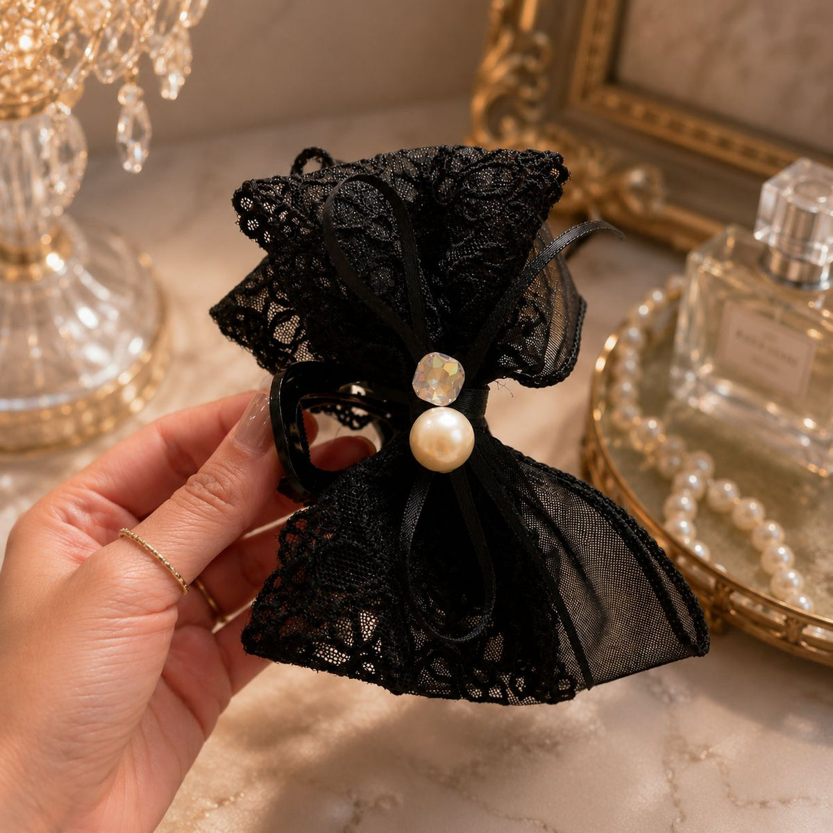Noir Elegance Pearl Bow Claw Clip