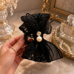 Noir Elegance Pearl Bow Claw Clip