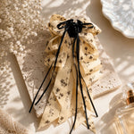 The Romantic Bow Claw